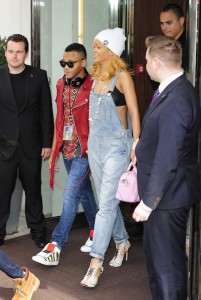 Rihanna leaves her London Hotel with her brother