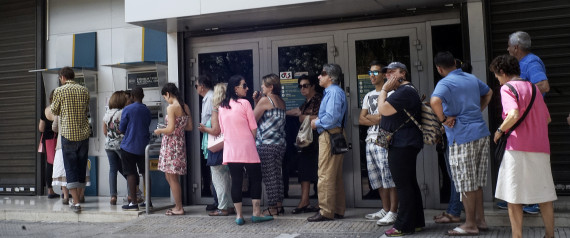 ATHENS, GREECE - JUNE 27:  Greeks queue in front of the National Bank to use ATM to withdraw cash as Parliament holds an emergency session for the government's proposed referendum June 27, 2015 in Athens, Greece. Greece's fraught bailout talks with its creditors took a dramatic turn early Saturday, with the radical left government announcing a referendum in just over a week on the latest proposed deal . (Photo by Milos Bicanski/Getty Images)